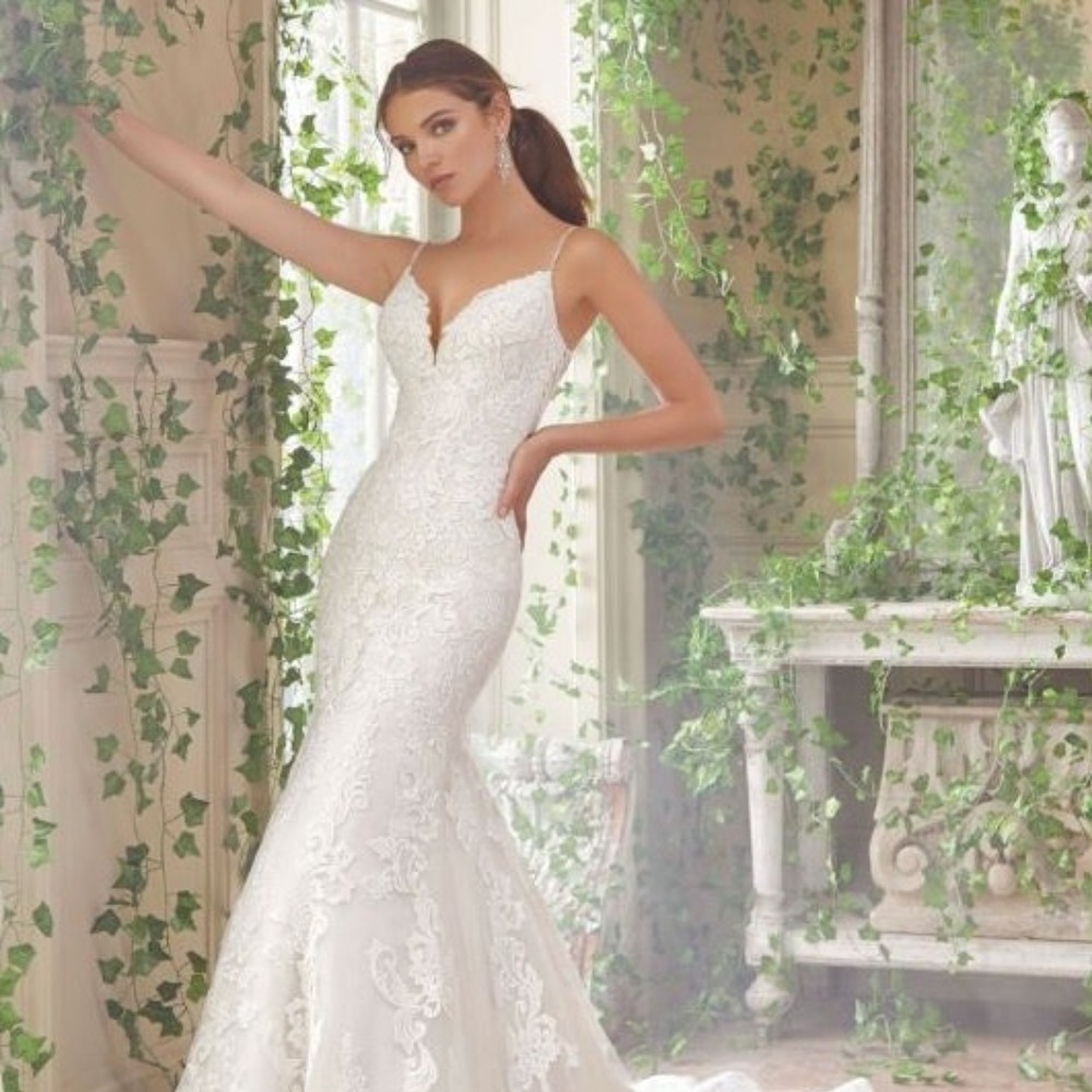 woman in a wedding dress with vines