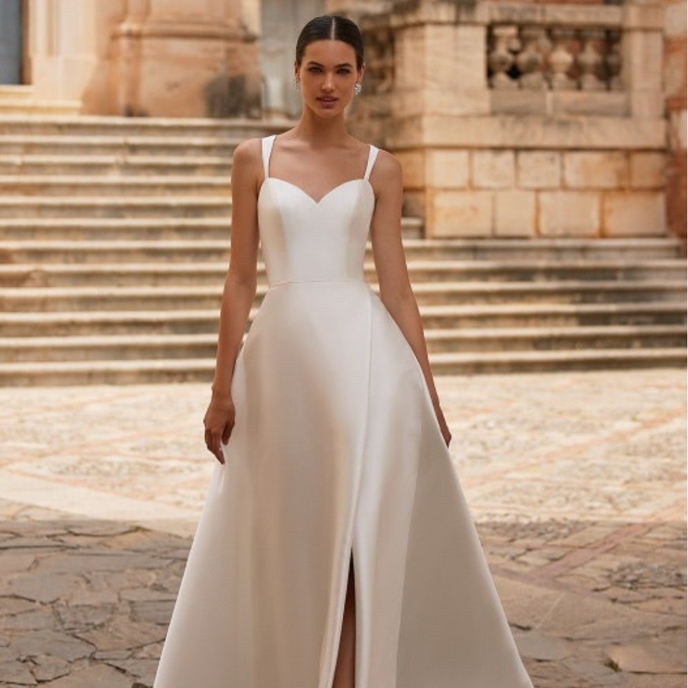 woman in a silk wedding dress