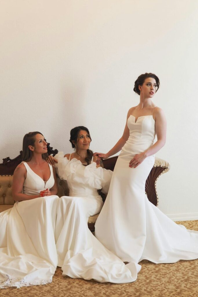 group of women in wedding dresses