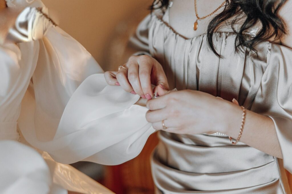 Seamstress working on a wedding dress