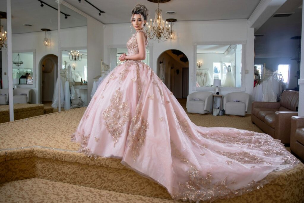 pink and gold quinceanera dress